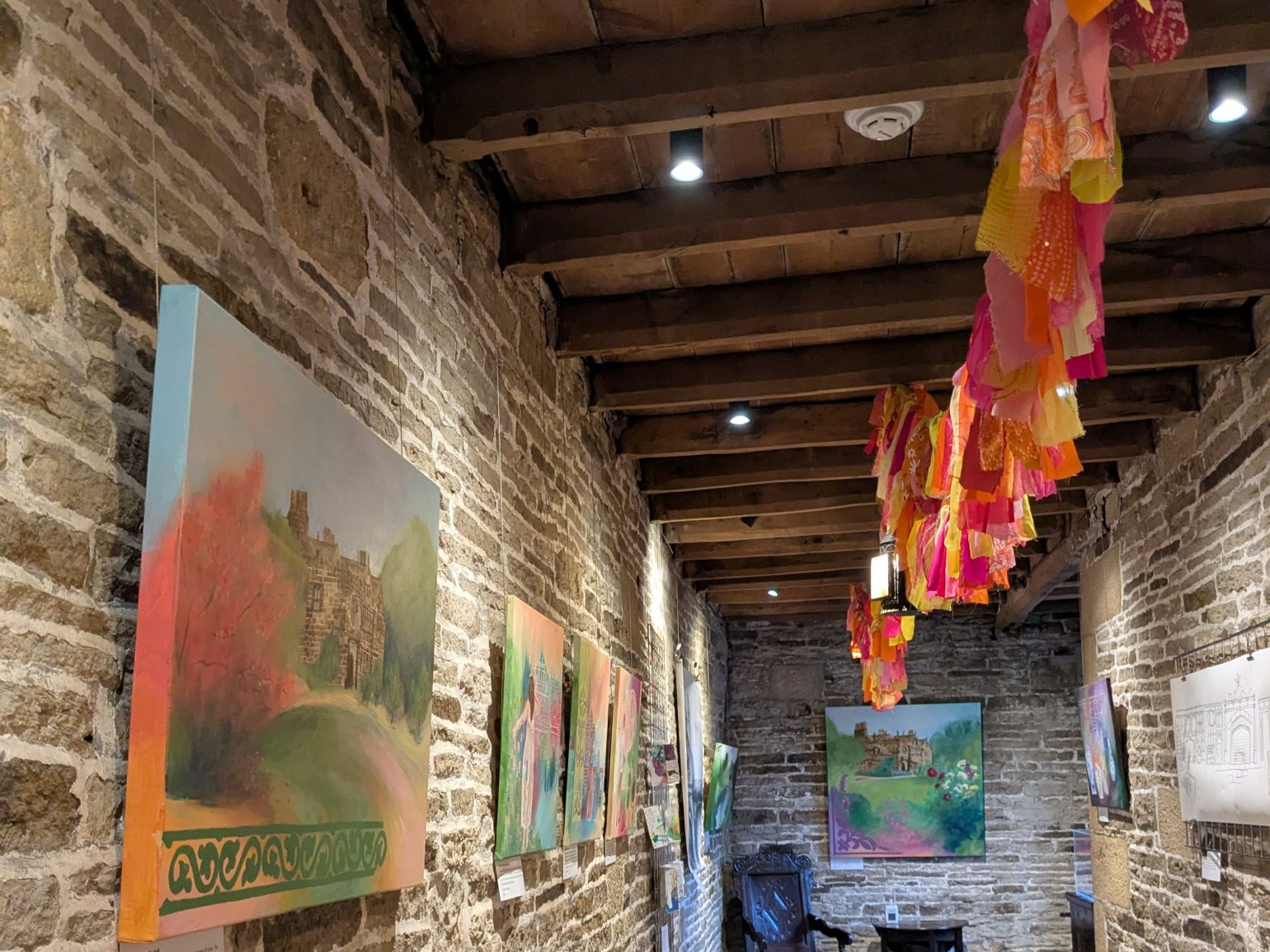 The entrance hall at East Riddlesden Hall, National Trust, with artworks on displayed