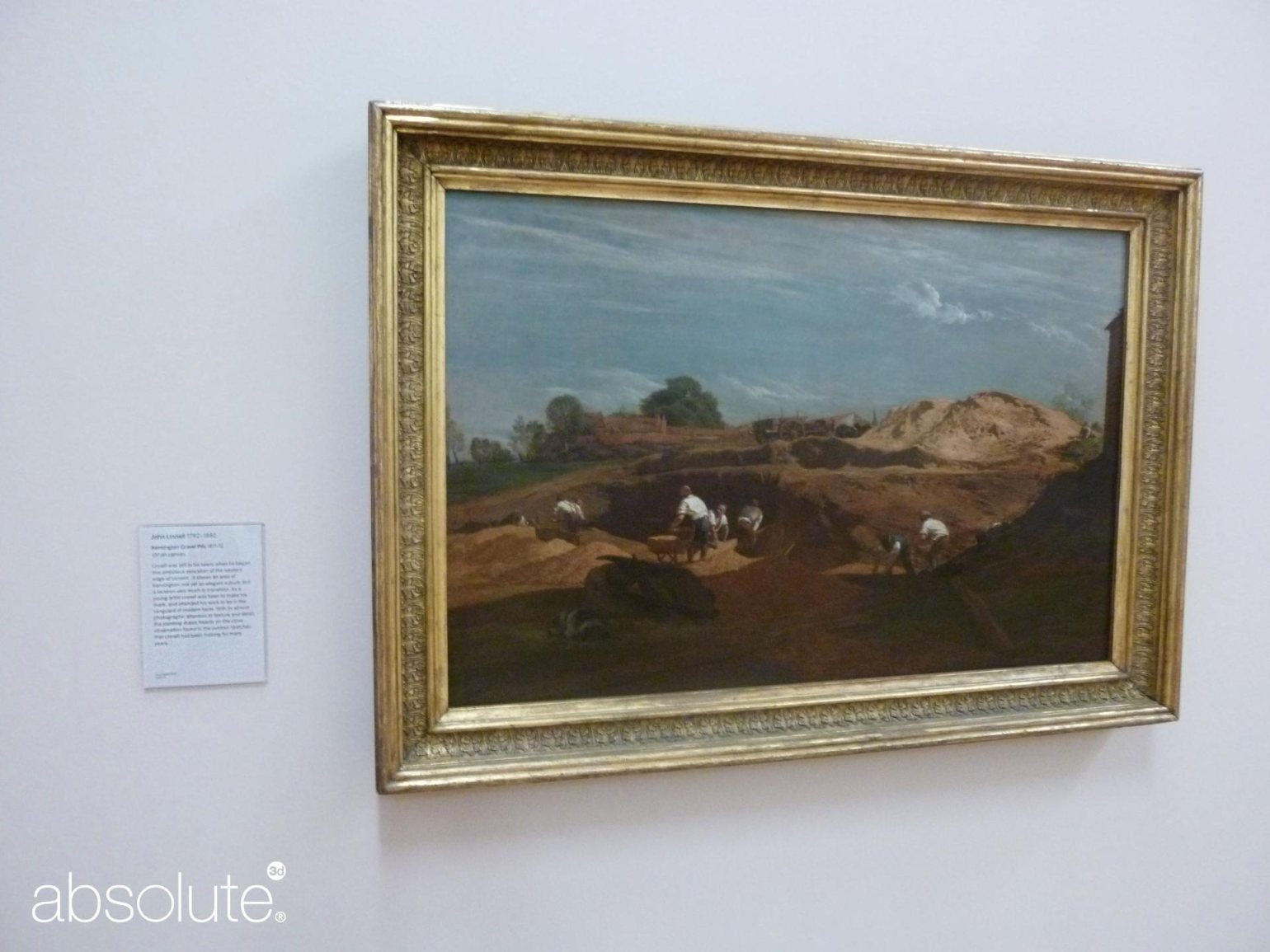 Artwork in golden frame, with related information displayed in an Absolute Label Holder.  Artwork in golden frame, with related information displayed in an Absolute Label Holder.